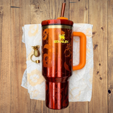 The Stanley 1913 x KAROL G 40 oz Quencher H2.O Flow State Tumbler